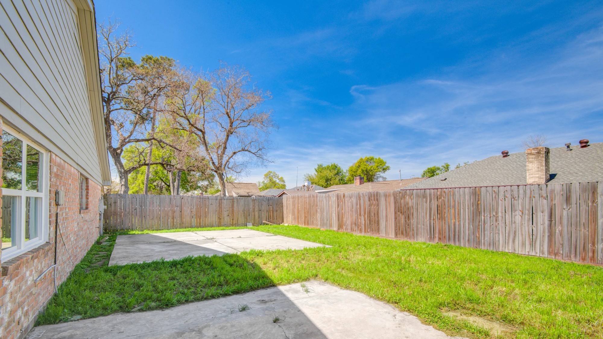 13747 Rampchester Lane Houston, TX 77015 - Photo 23 of 24 a view of a backyard with a small cabin