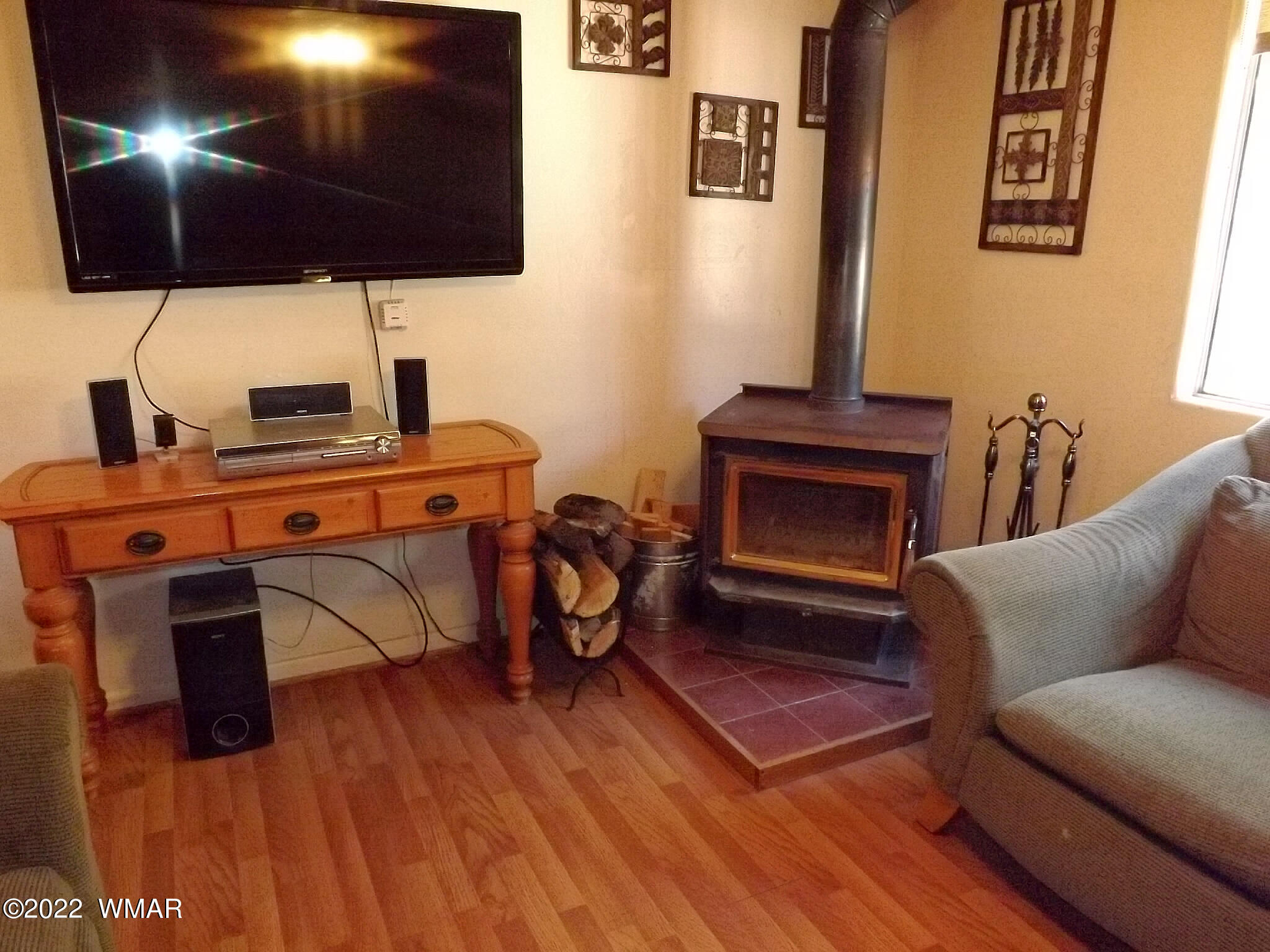 2057 Shot Gun Road Overgaard, AZ 85933 - Photo 15 of 24 a living room with furniture and a fireplace
