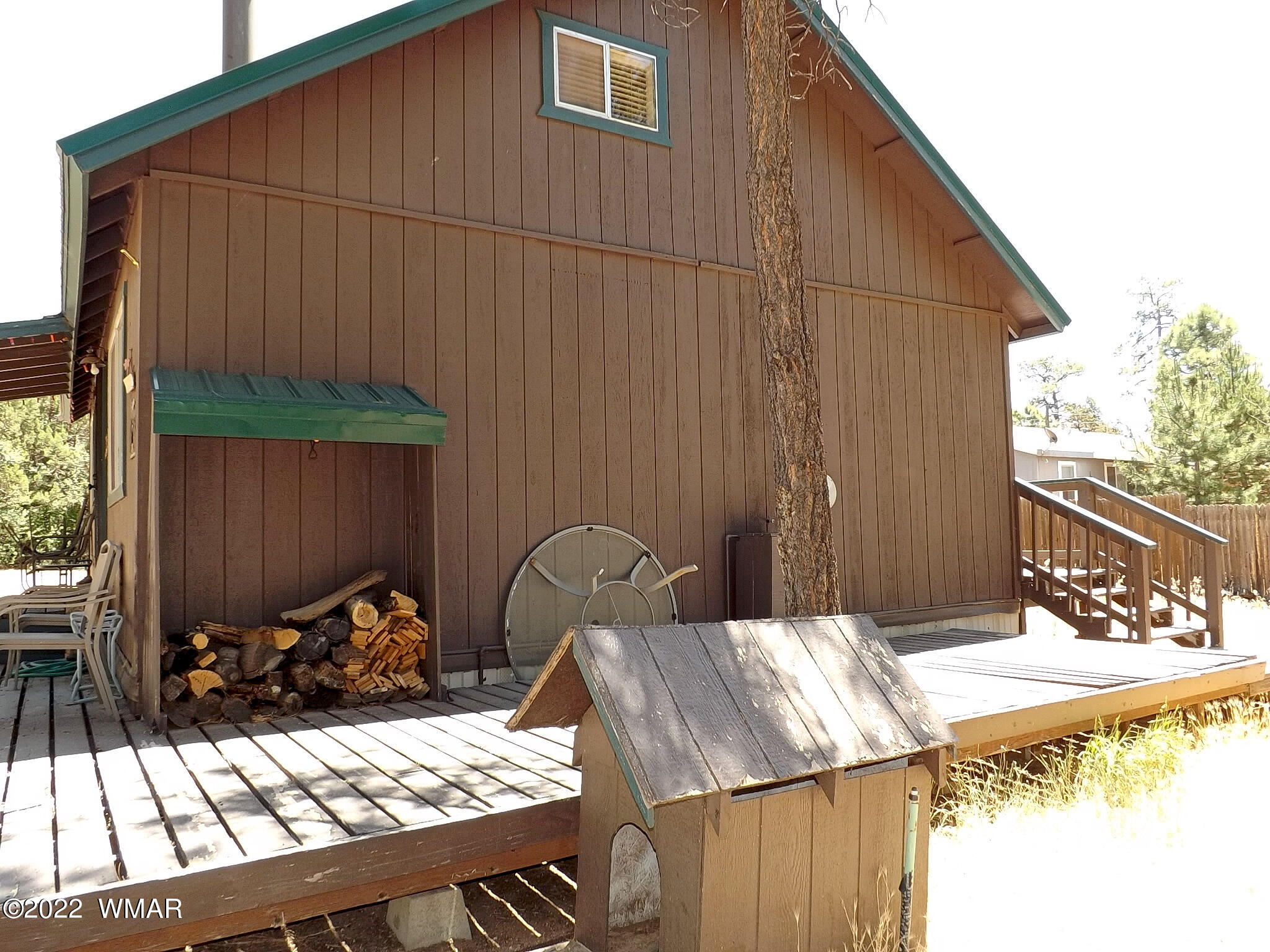 2057 Shot Gun Road Overgaard, AZ 85933 - Photo 4 of 24 a view of a patio with a table and chairs