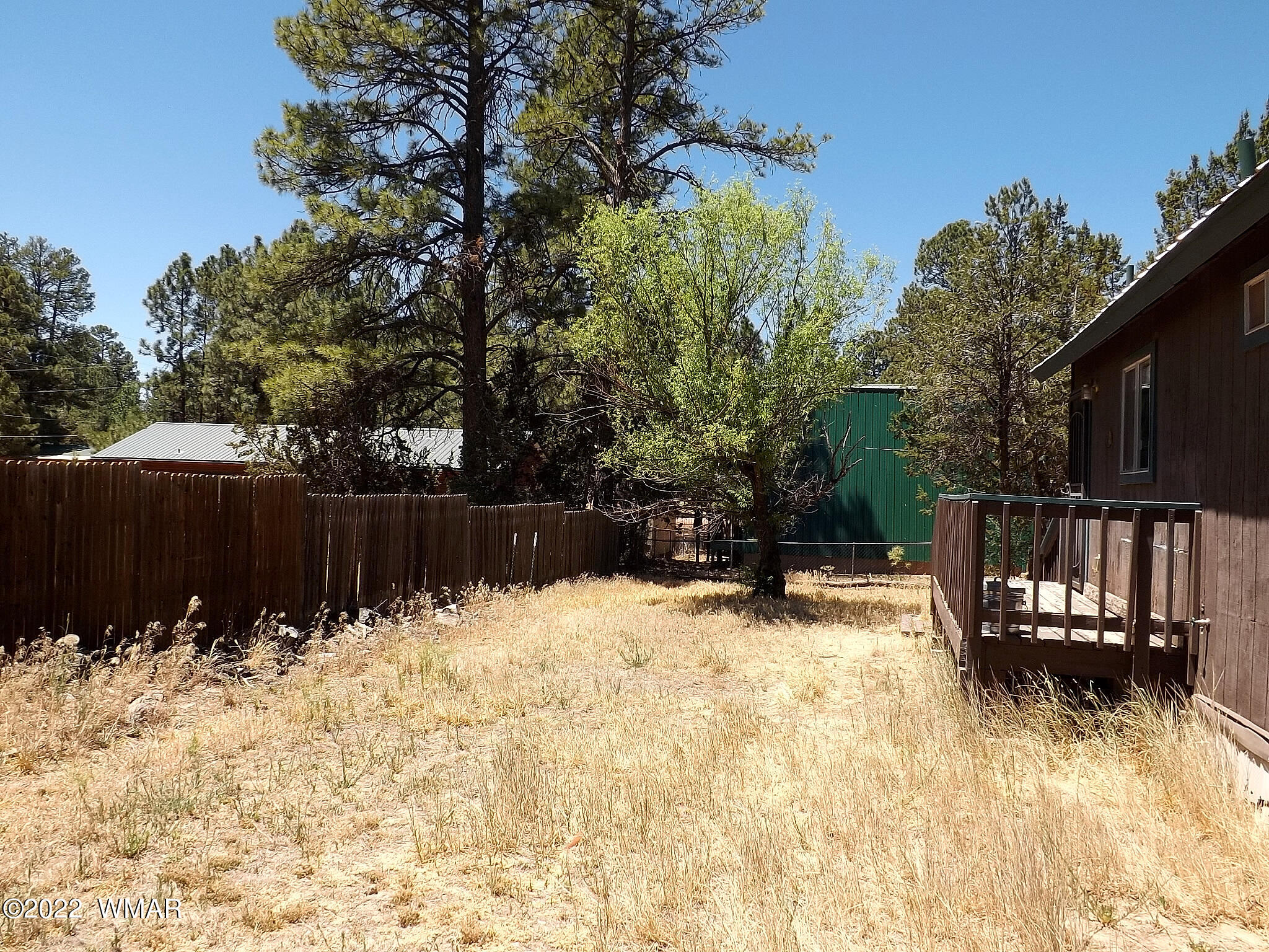 2057 Shot Gun Road Overgaard, AZ 85933 - Photo 9 of 24 a view of wooden fence
