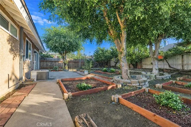 a view of yard with outdoor seating