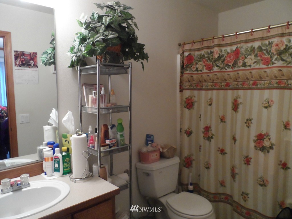 303 Index Place Southeast Renton, WA 98056 - Photo 8 of 14 a bathroom with a sink toilet and shower