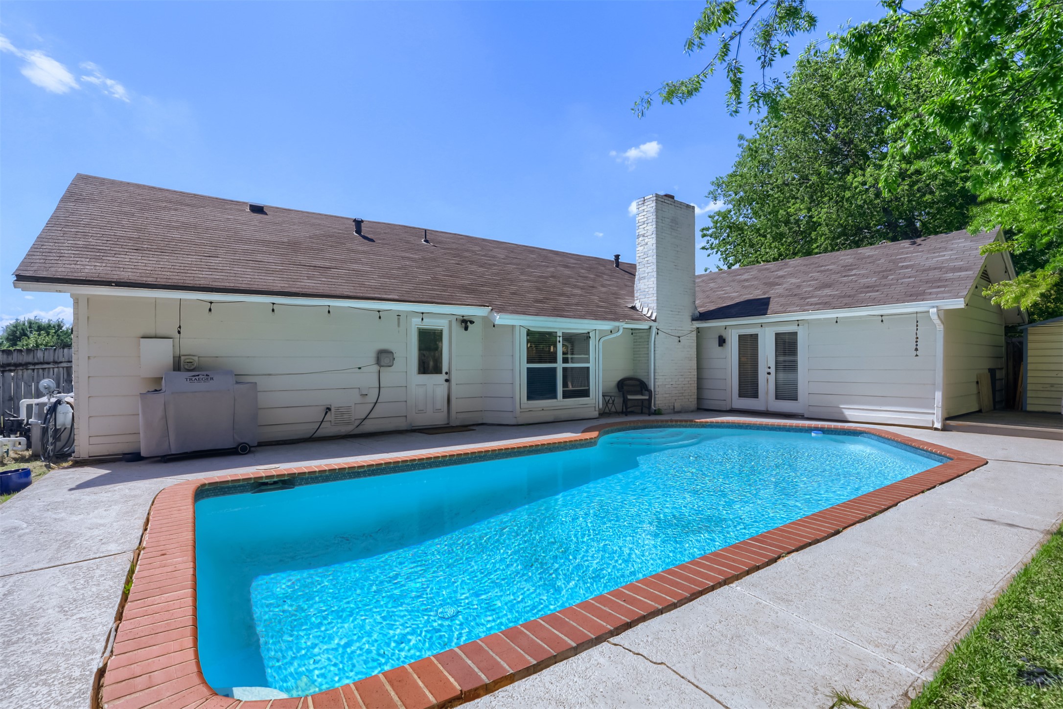 9016 West Pointer Lane Austin, TX 78758 - Photo 2 of 29 a front view of a house with swimming pool