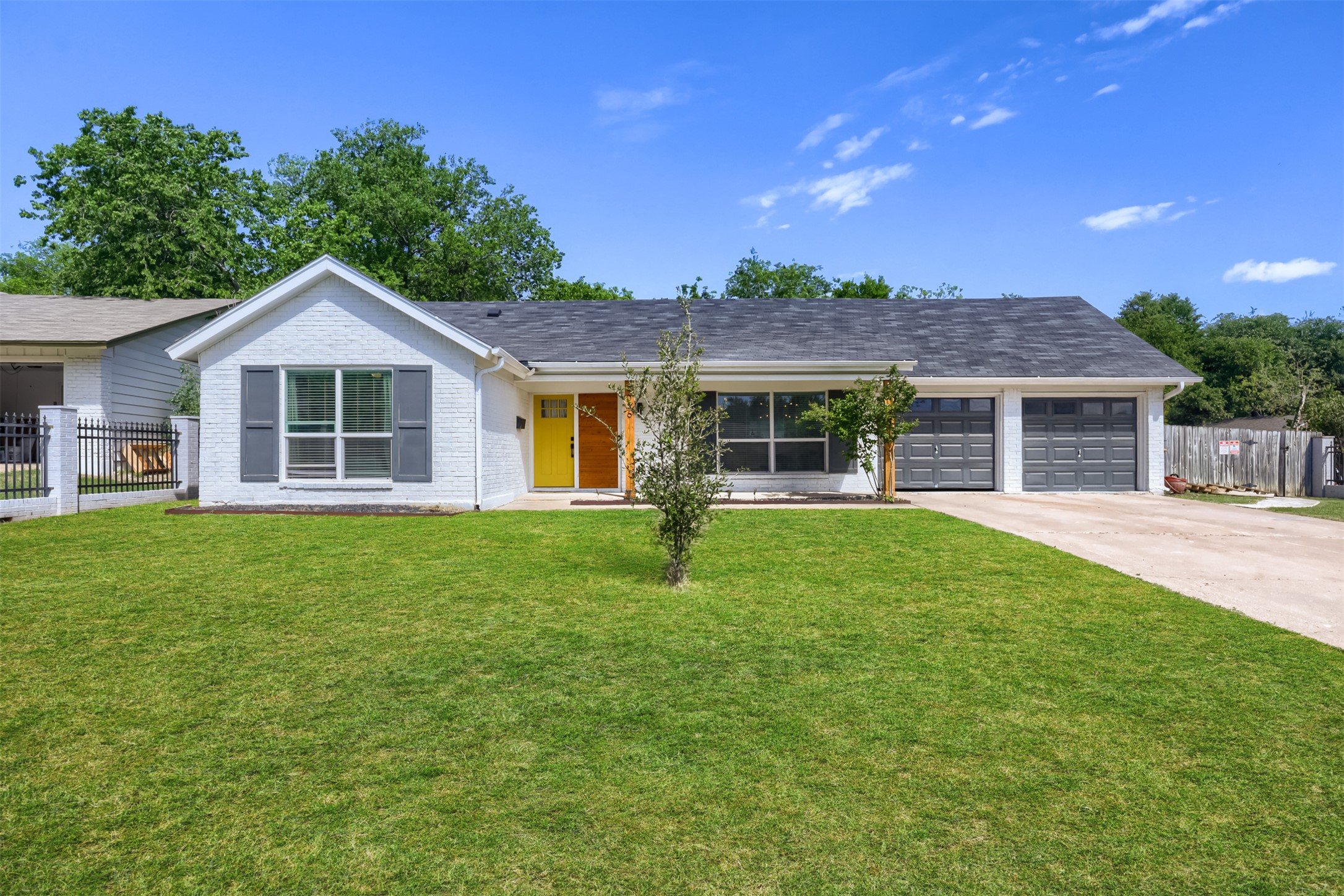 9016 West Pointer Lane Austin, TX 78758 - Photo 4 of 29 a front view of a house with a garden