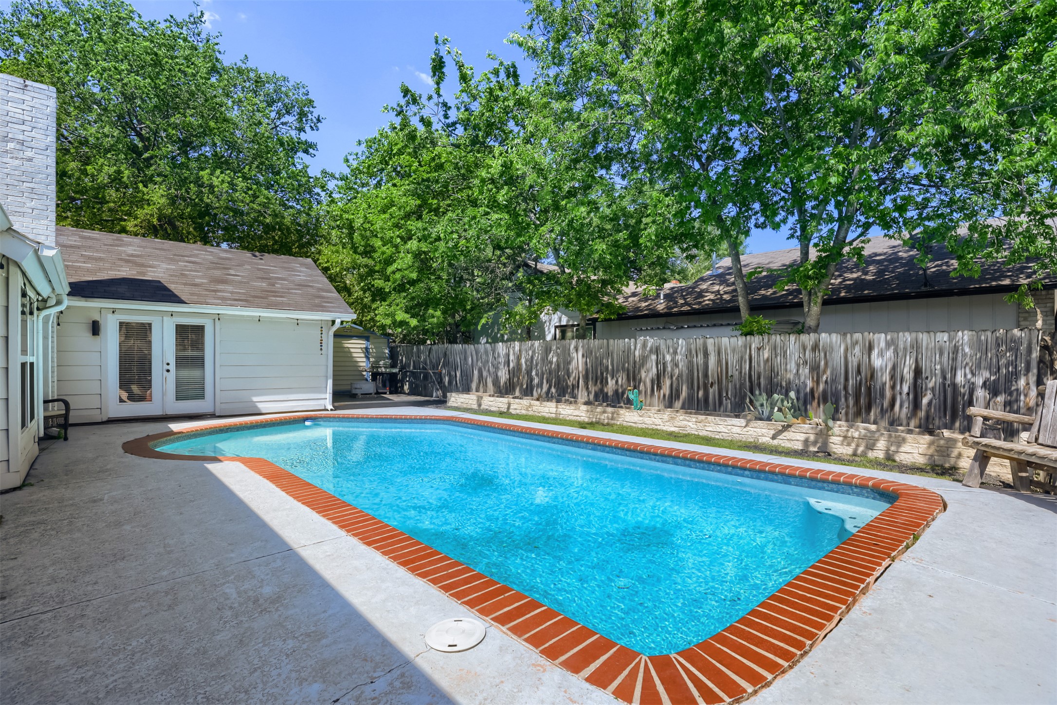 9016 West Pointer Lane Austin, TX 78758 - Photo 5 of 29 a view of a house with swimming pool and a yard