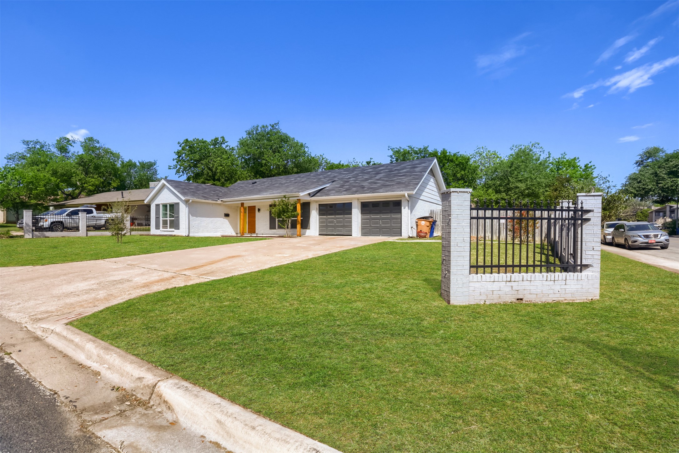 9016 West Pointer Lane Austin, TX 78758 - Photo 8 of 29 a front view of a house with a garden