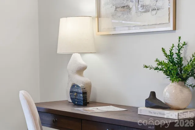 a vase of flowers sitting on a table