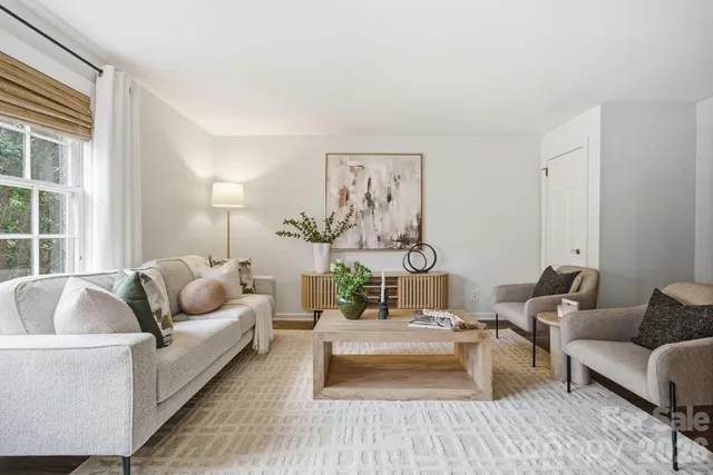 a living room with furniture and a couch
