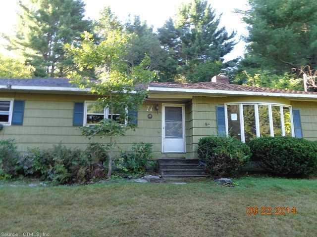 71 Porter Plain Road Thompson, CT 06277 - Photo 1 of 1 a view of a house with a yard