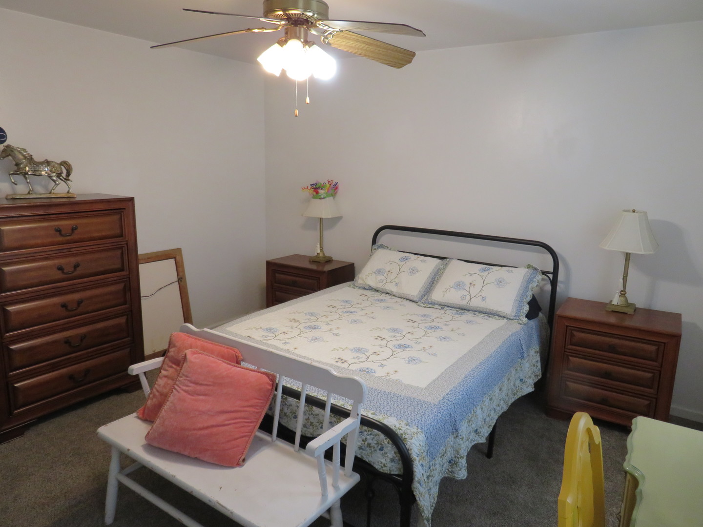 310 Rodenburg Road Roselle, IL 60172 - Photo 19 of 56 a bedroom with a bed and a chandelier