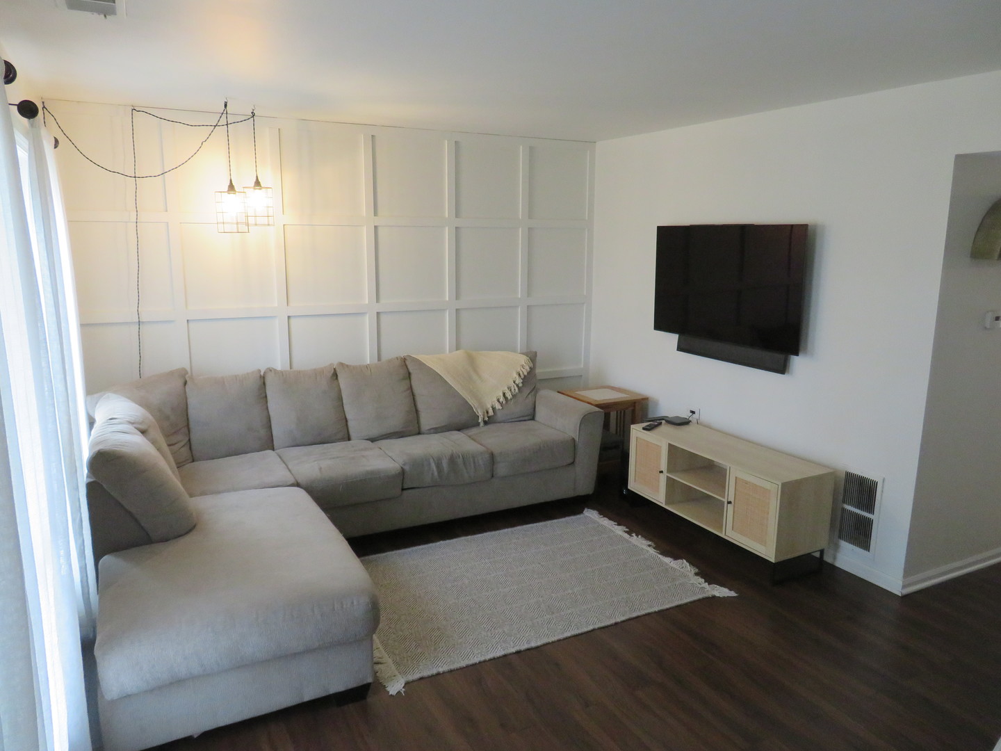 310 Rodenburg Road Roselle, IL 60172 - Photo 5 of 56 a living room with furniture and a flat screen tv