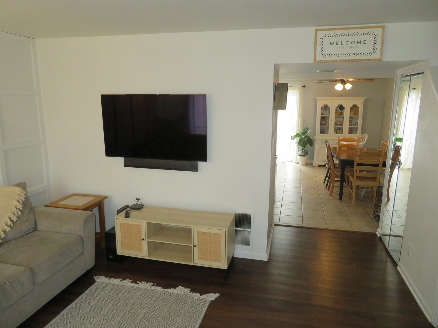 310 Rodenburg Road Roselle, IL 60172 - Photo 6 of 56 a living room with furniture and a flat screen tv