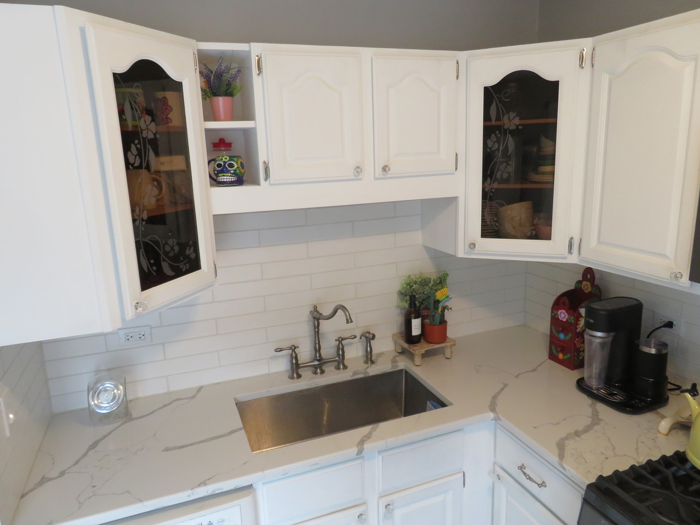 310 Rodenburg Road Roselle, IL 60172 - Photo 9 of 56 a kitchen with a sink and cabinets