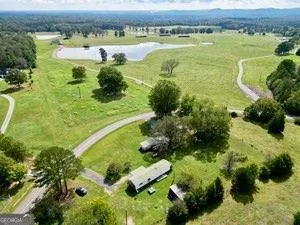a view of a lake with a big yard