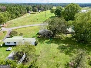 a view of a garden with a lake