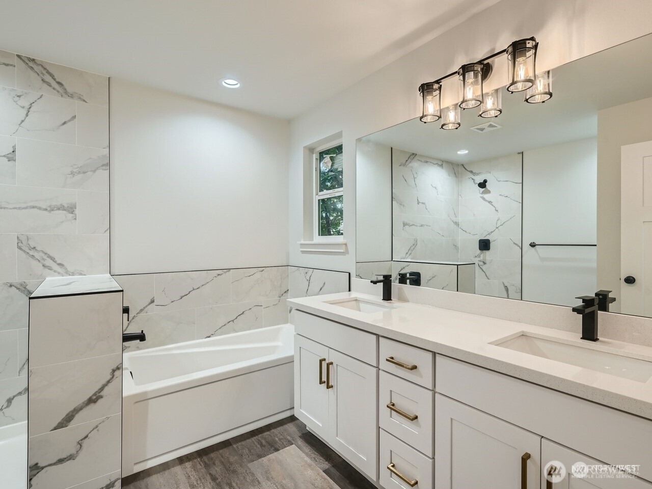 204 Date Avenue Sultan, WA 98294 - Photo 11 of 17 a bathroom with a sink double vanity granite tub shower and a mirror