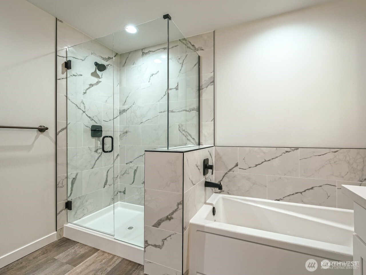 204 Date Avenue Sultan, WA 98294 - Photo 12 of 17 a bathroom with a bathtub and a shower