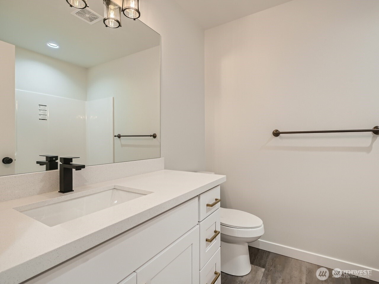 204 Date Avenue Sultan, WA 98294 - Photo 14 of 17 a bathroom with a sink toilet and vanity