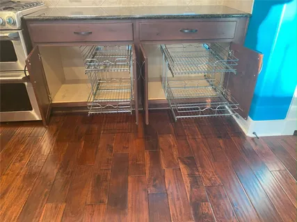 a view of front door with wooden floor