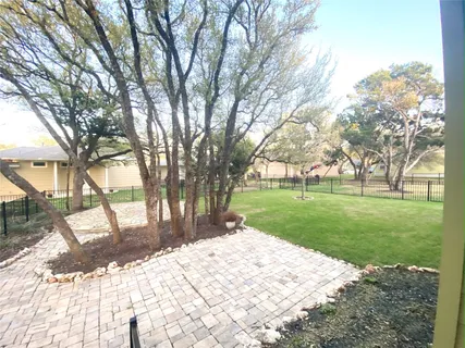 a view of a backyard with a garden