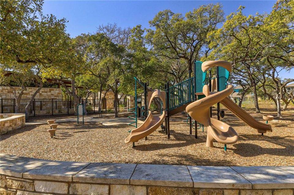 11200 Avery Station Loop, Unit 13 Austin, TX 78717 - Photo 37 of 39 a view of a house with backyard