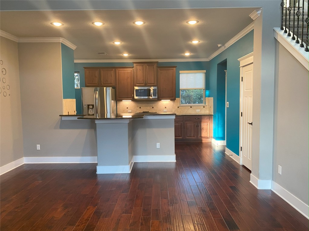 11200 Avery Station Loop, Unit 13 Austin, TX 78717 - Photo 6 of 39 a open kitchen with a sink and dish washer