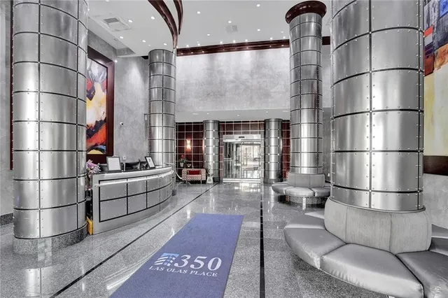 an entryway with a rug