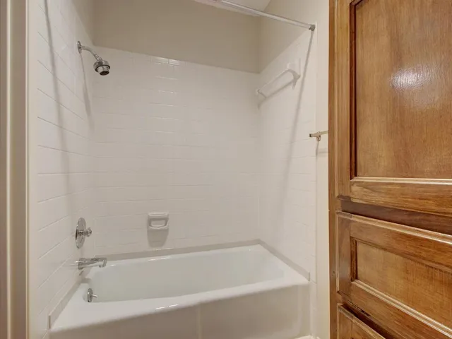 a bathroom with a bathtub