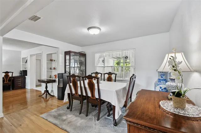 a view of a dining room with furniture