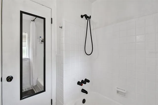 a view of a bathroom from the hallway