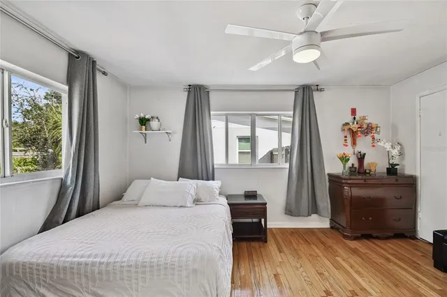 a bathroom with a granite countertop sink a mirror and a vanity
