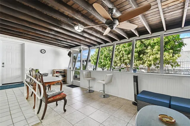 a kitchen with a table and chairs