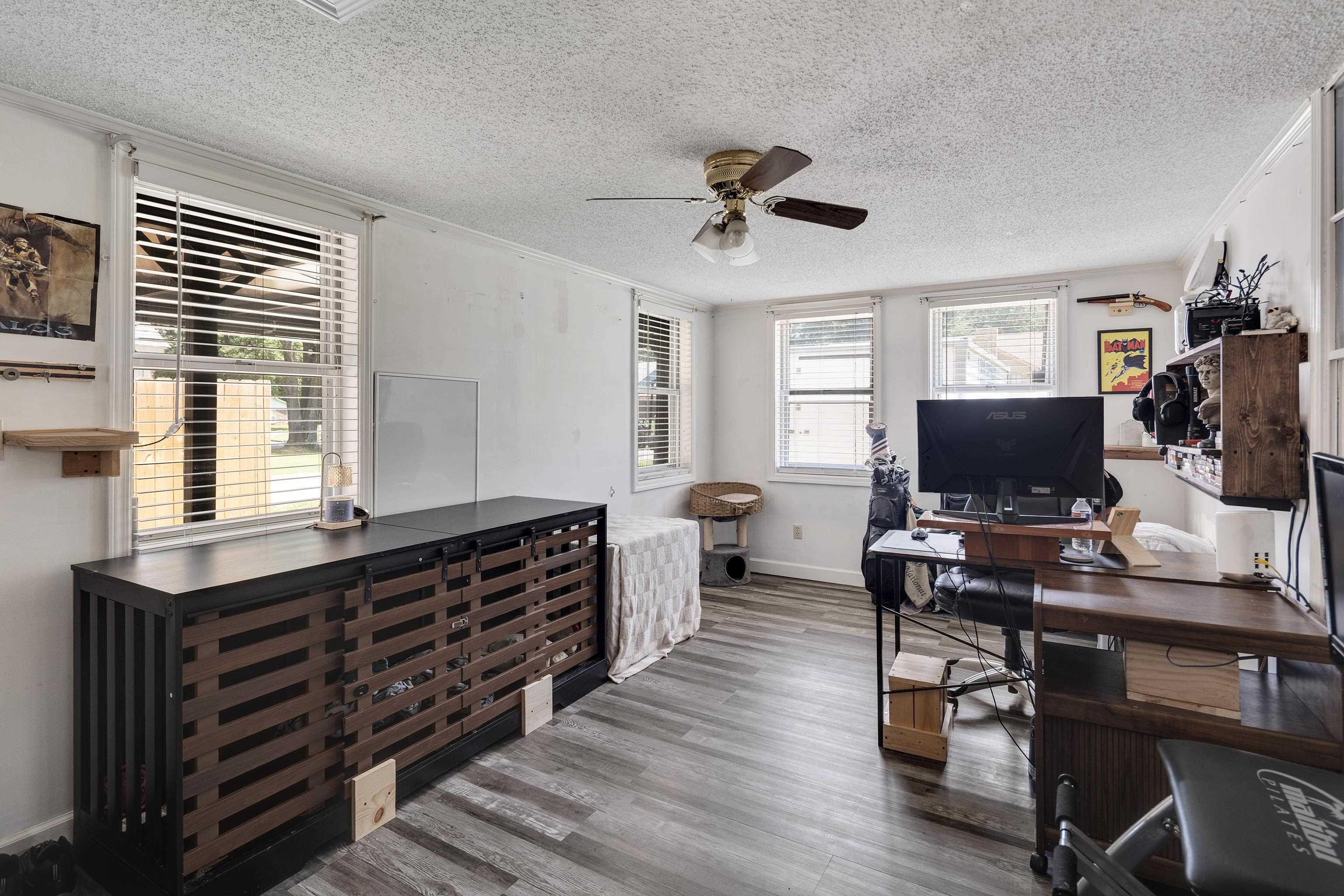 1137 Greenview Road Collierville, TN 38017 - Photo 15 of 35 a view of a workspace with furniture and a window
