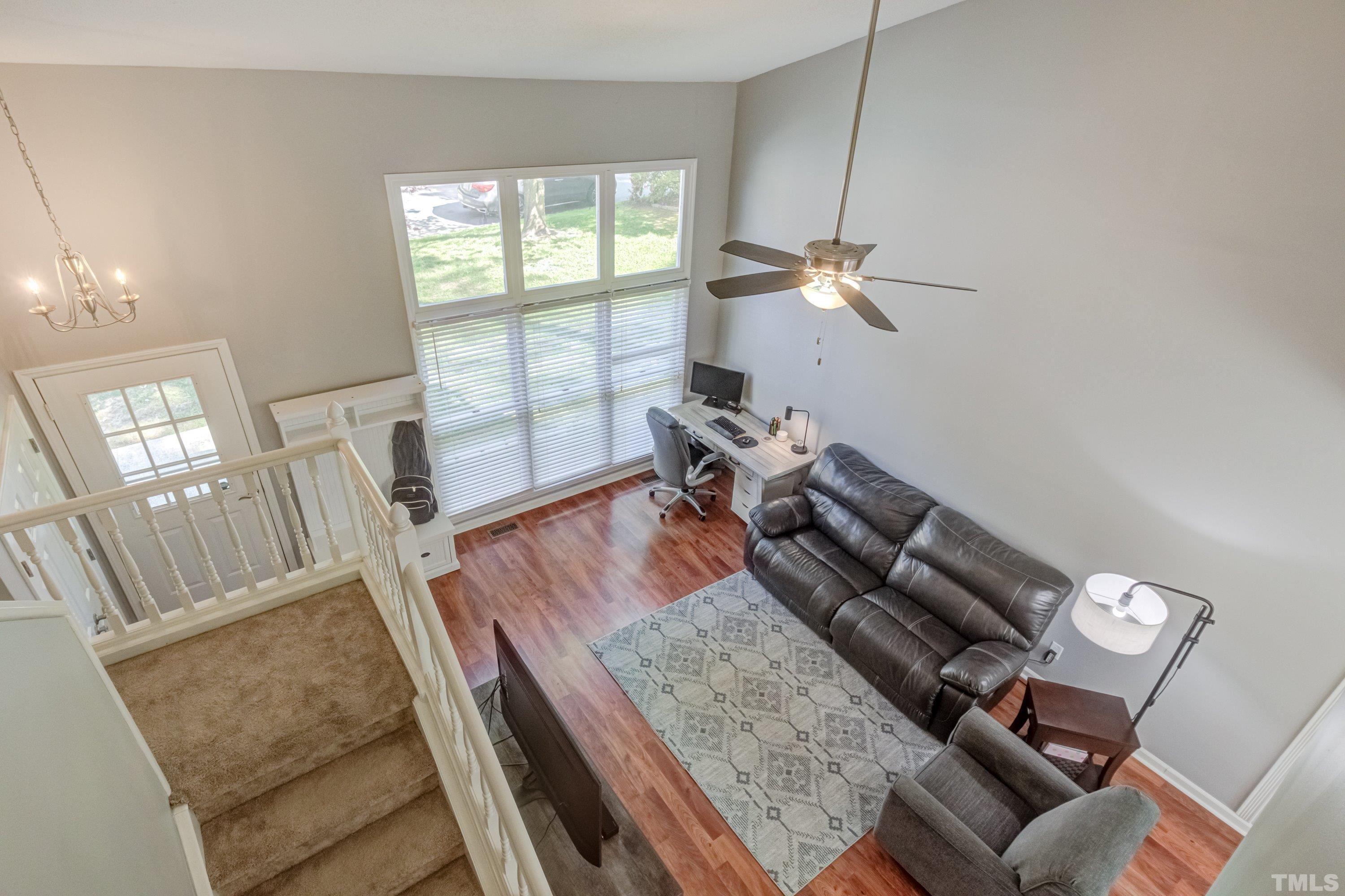 105 McIntire Lane Cary, NC 27513 - Photo 25 of 32 a living room with furniture