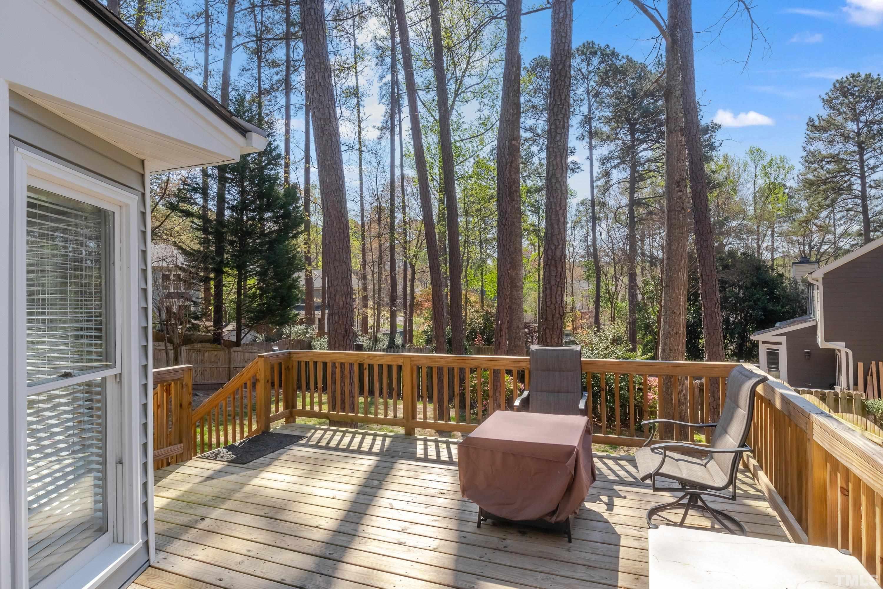 105 McIntire Lane Cary, NC 27513 - Photo 26 of 32 a view of balcony with couches and wooden floor