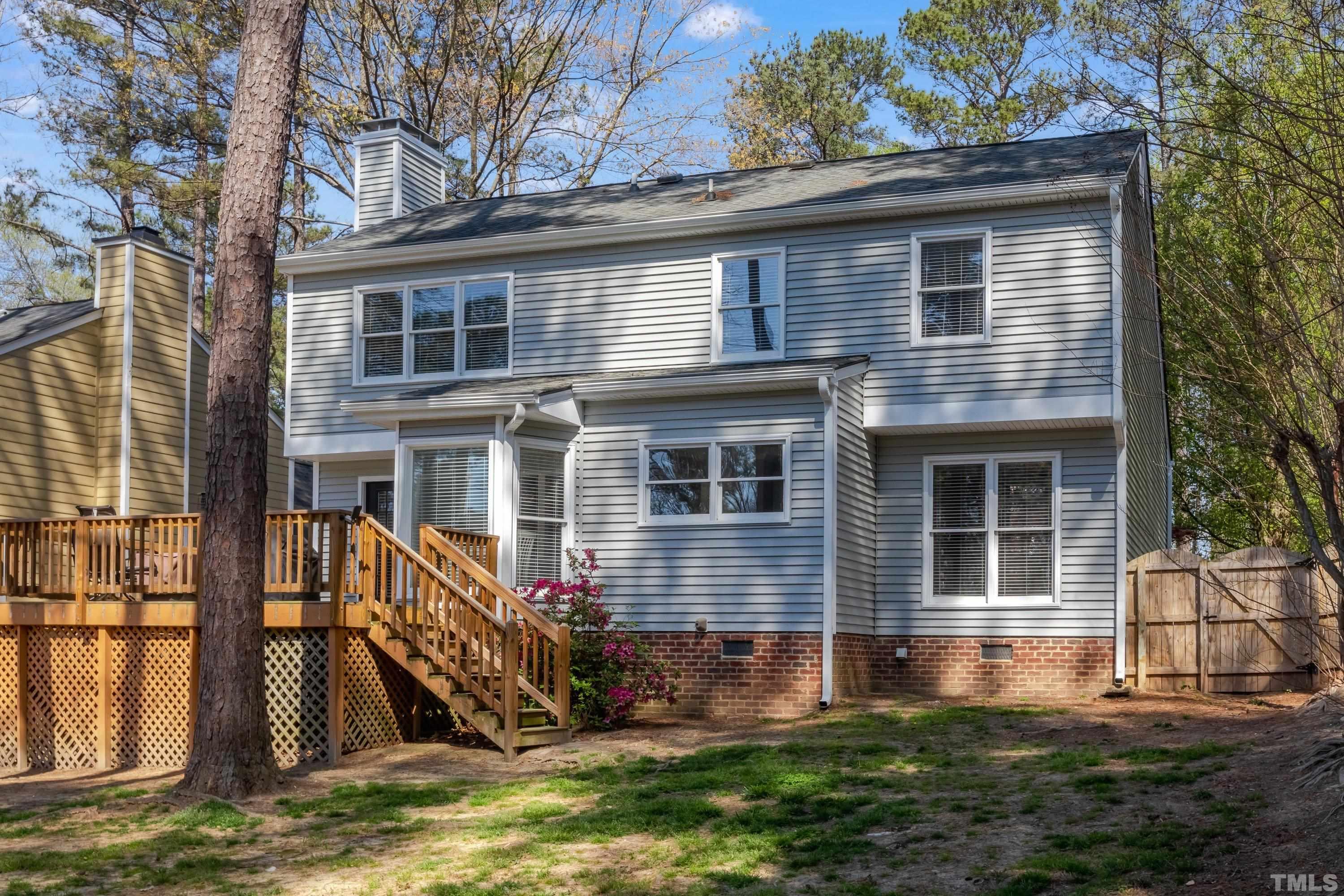 105 McIntire Lane Cary, NC 27513 - Photo 28 of 32 a view front of house with a yard