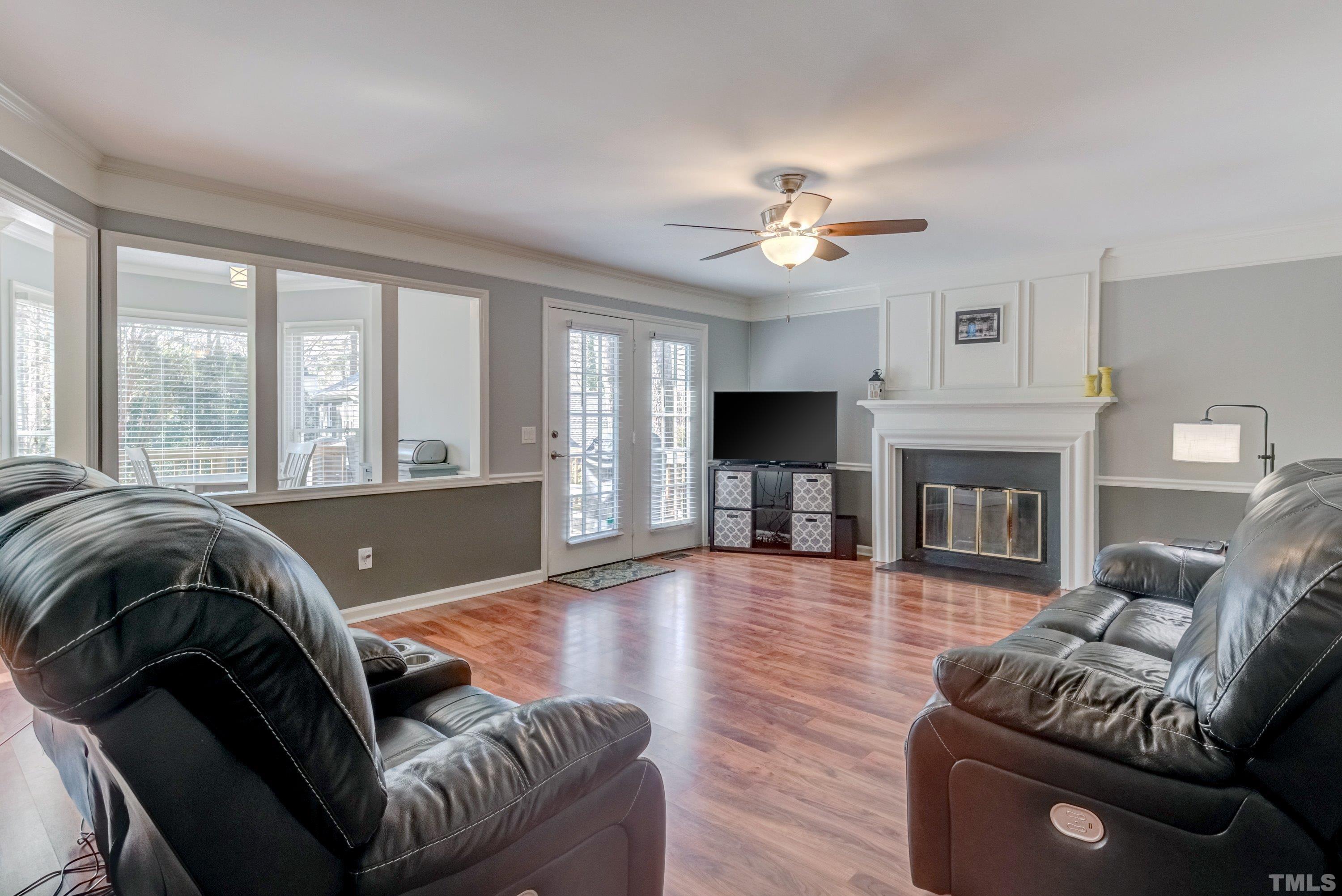105 McIntire Lane Cary, NC 27513 - Photo 7 of 32 a living room with furniture fireplace and flat screen tv