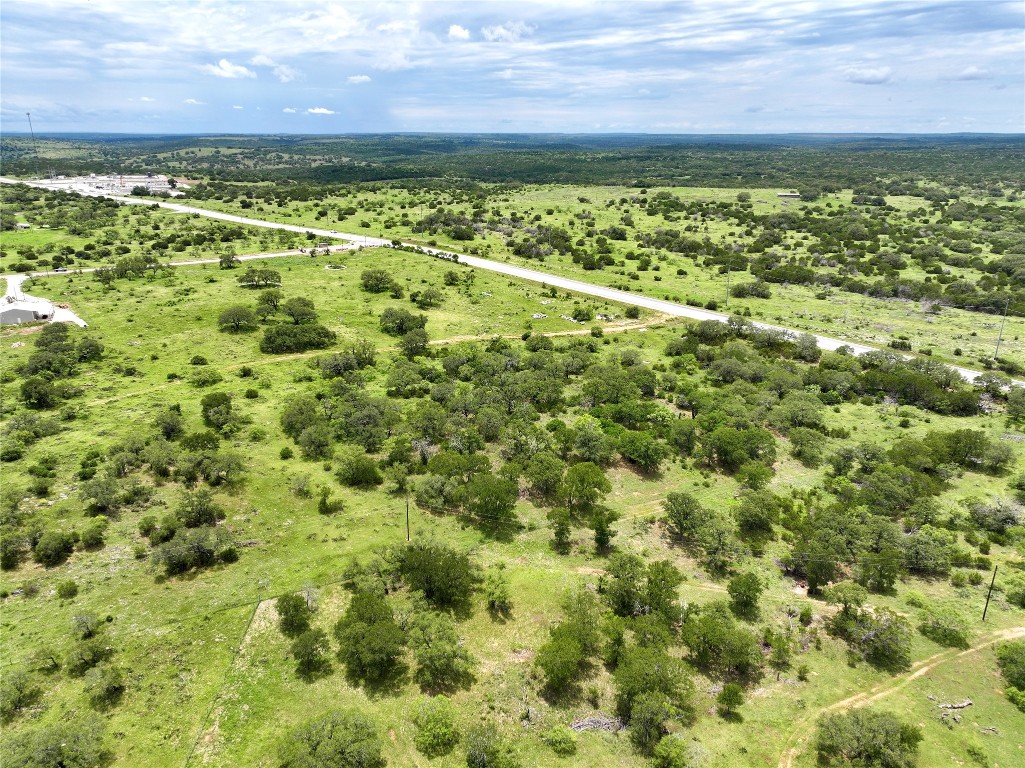 209 Rocky Holw Road San Saba, TX 76877 - Photo 8 of 8 a view of a yard with an outdoor space