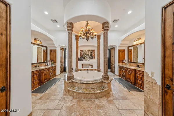 a bathroom with bathtub and a shower
