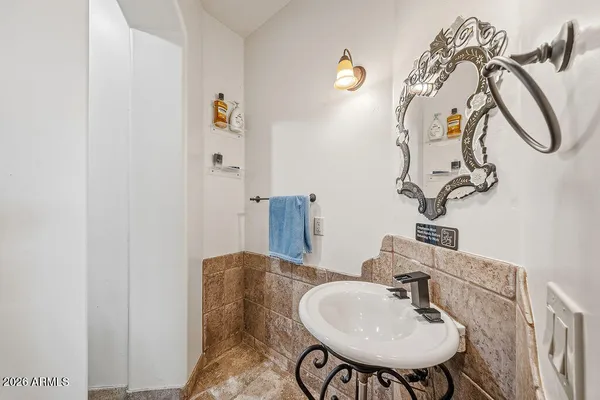 a view of a living room and bathroom