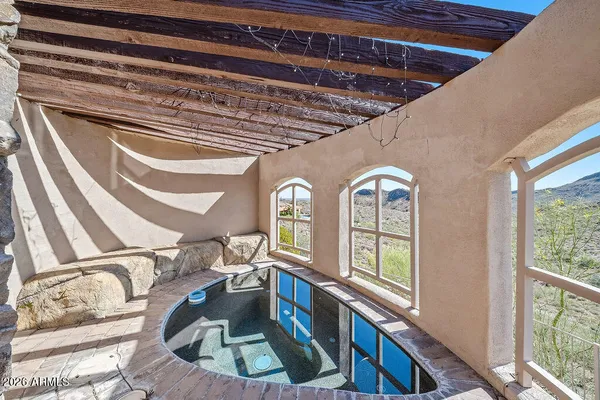 a building exterior with furniture