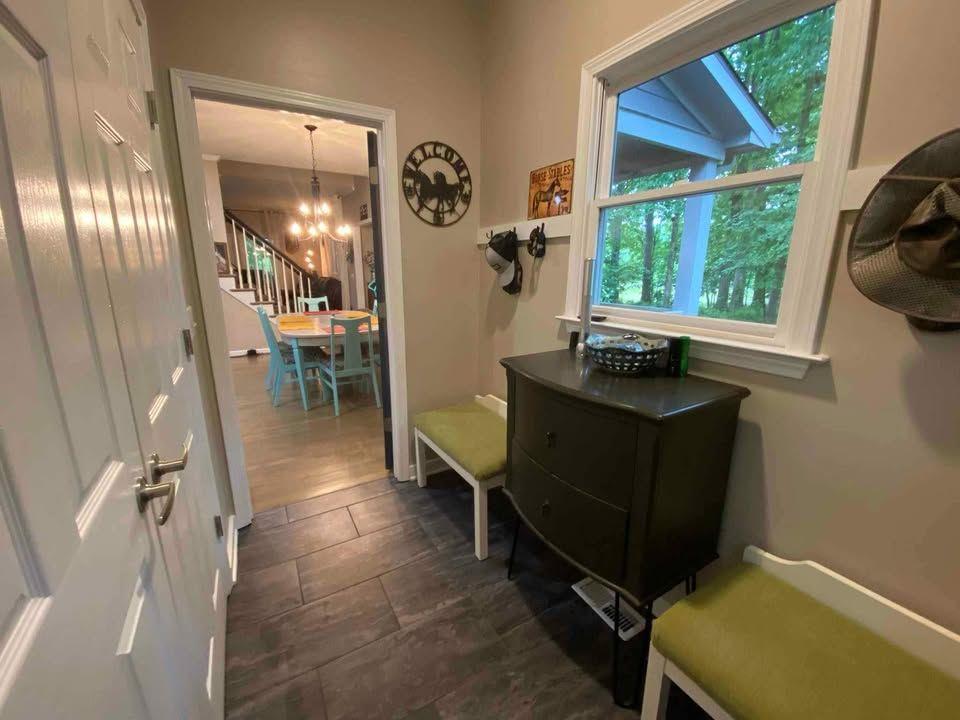 4005 South Apple Valley Road Commerce, GA 30529 - Photo 13 of 17 a room with furniture and a window