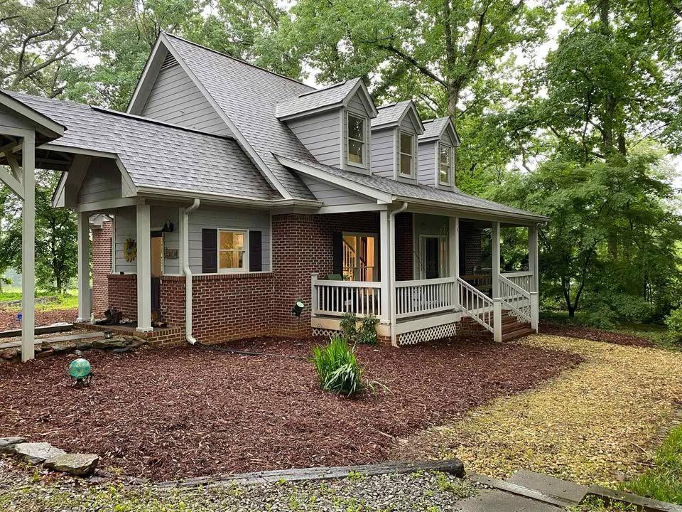 4005 South Apple Valley Road Commerce, GA 30529 - Photo 3 of 17 a view of house with a yard