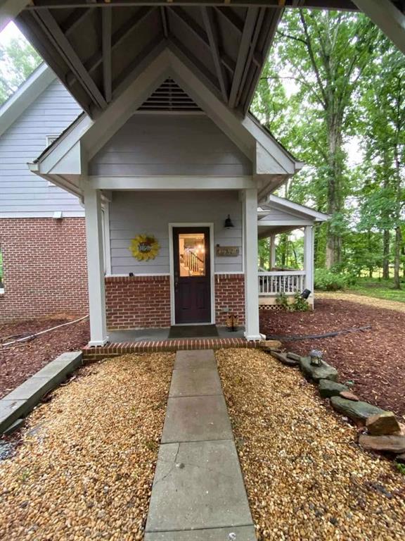 4005 South Apple Valley Road Commerce, GA 30529 - Photo 5 of 17 a view of a house with a yard