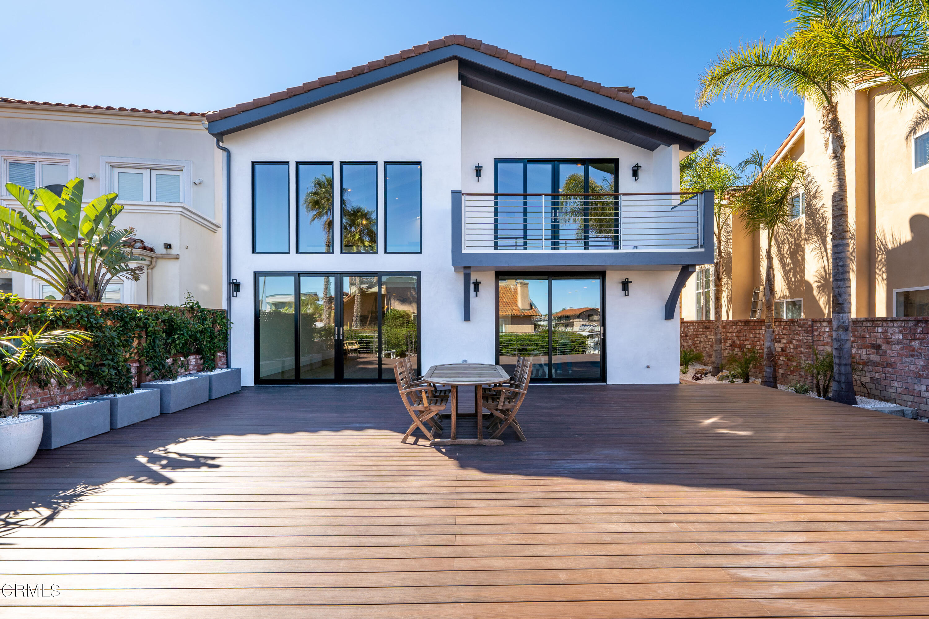 2520 Peninsula Road Oxnard, CA 93035 - Photo 2 of 62 a view of a house with sitting area and garden
