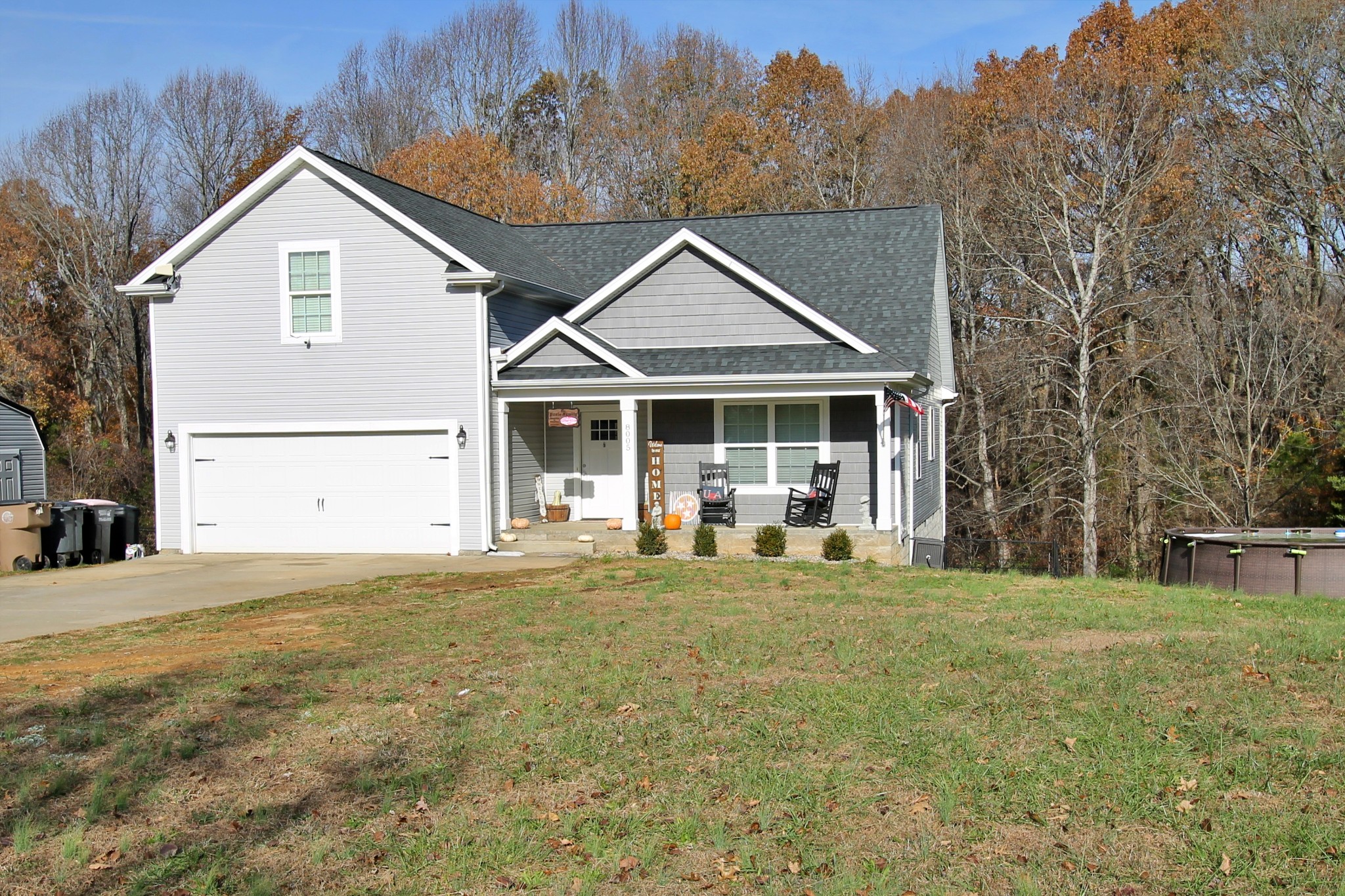 8005 New Chapel Road Springfield, TN 37172 - Photo 2 of 28 a front view of a house with a yard and trees