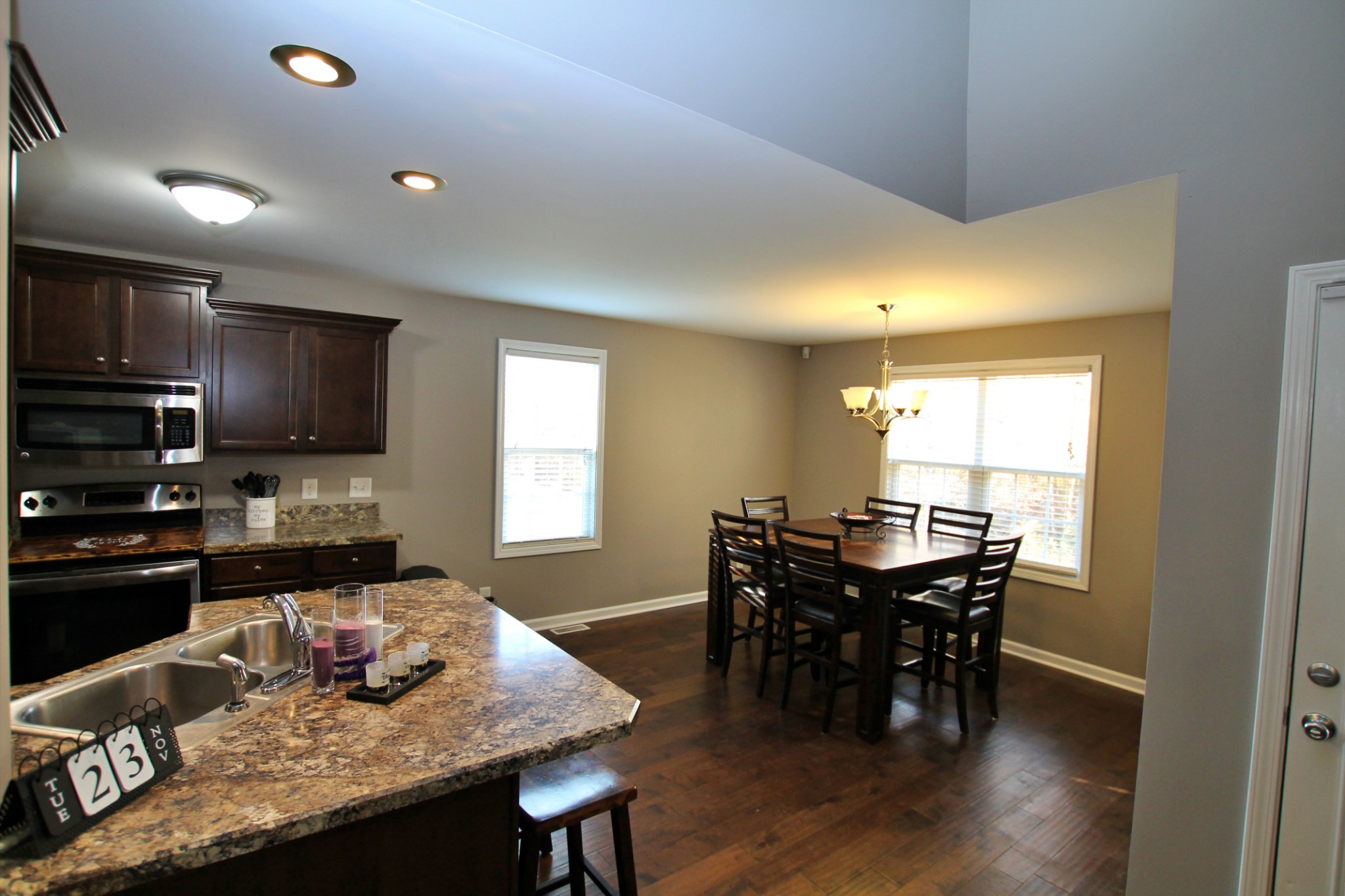 8005 New Chapel Road Springfield, TN 37172 - Photo 14 of 28 a view of a dining room with furniture and wooden floor