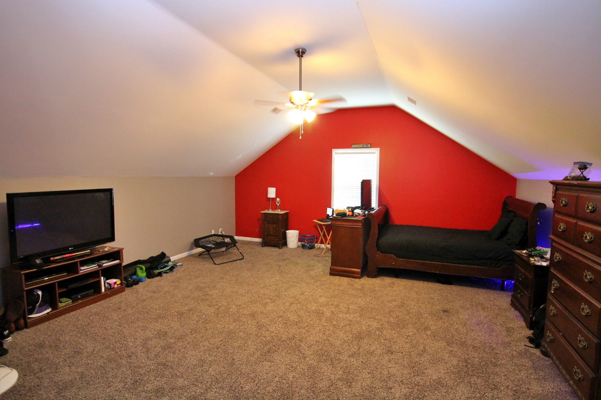 8005 New Chapel Road Springfield, TN 37172 - Photo 23 of 28 a room with furniture and a flat screen tv