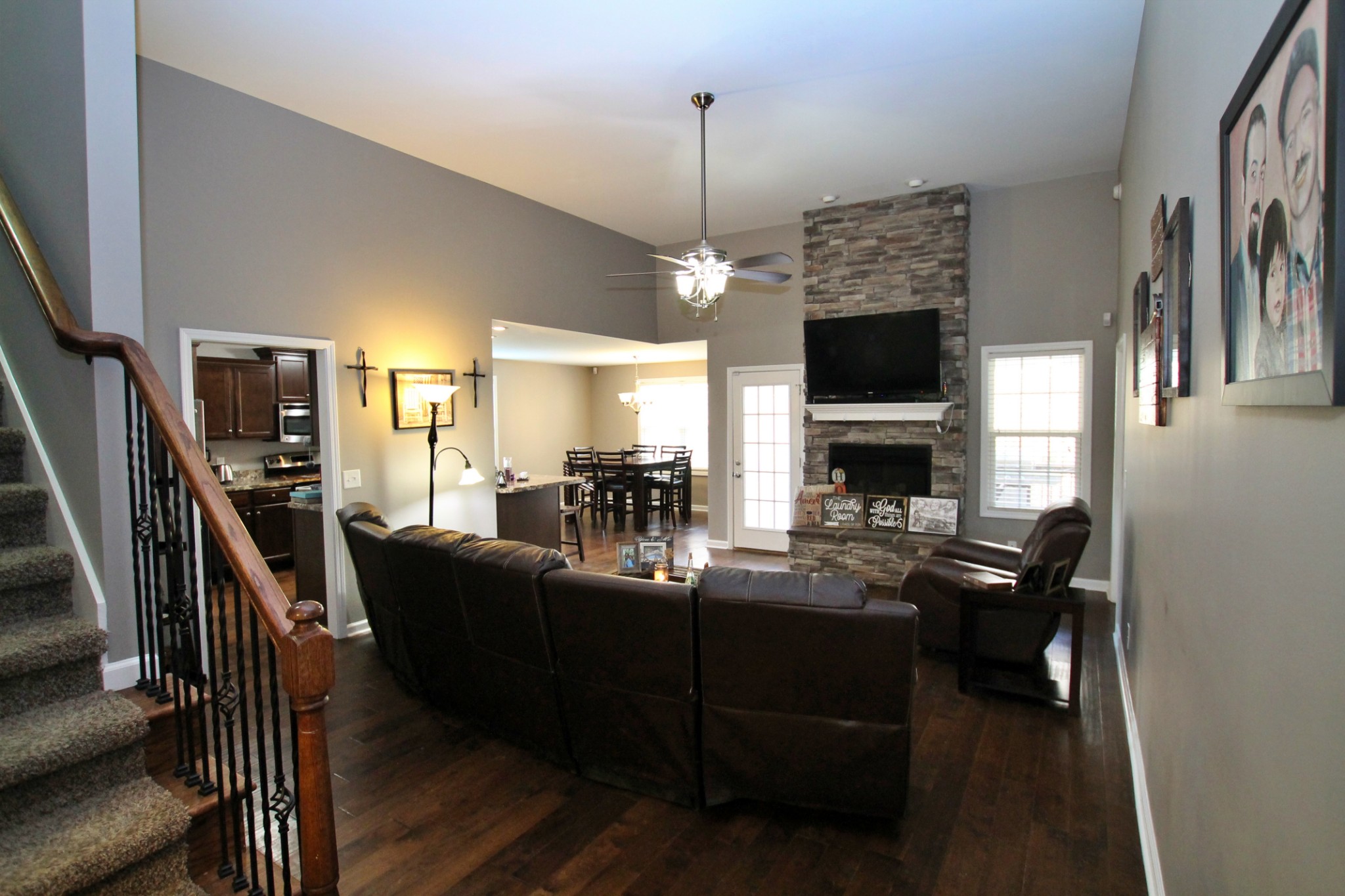 8005 New Chapel Road Springfield, TN 37172 - Photo 6 of 28 a living room with fireplace furniture and a flat screen tv