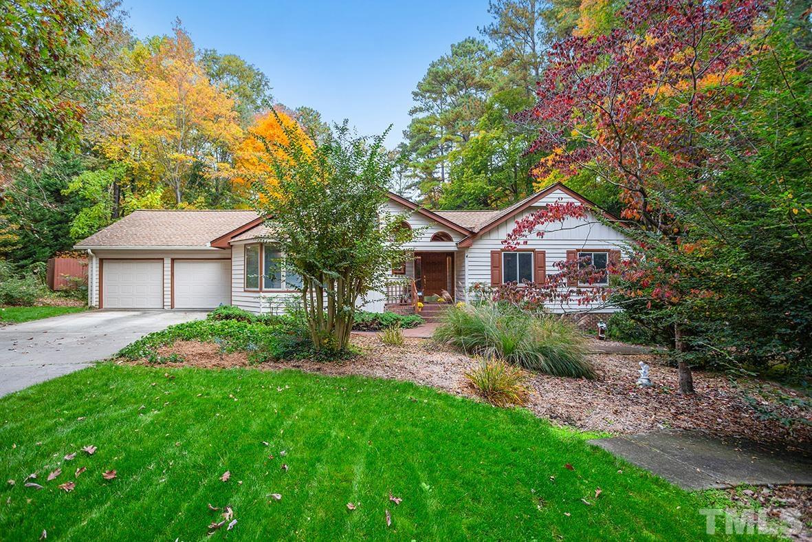 105 Carriage Trail Raleigh, NC 27614 - Photo 1 of 32 a front view of a house with garden